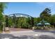 Welcoming entrance to Main Street Park with lush greenery and scenic views under a clear sky at 10 Shearin Ln, Youngsville, NC 27596