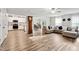 Open-concept living space featuring hardwood floors, ample natural light, and a stylish design at 10 Shearin Ln, Youngsville, NC 27596