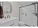 Elegant bathroom featuring a glass-enclosed shower, modern fixtures, and stylish vanity at 104 Chuckwagon Dr, Louisburg, NC 27549