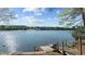 Scenic lake view from the private dock with ladder access at 104 Chuckwagon Dr, Louisburg, NC 27549