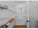 Walk-in pantry with ample shelving and storage space, providing organized kitchen solutions at 104 Chuckwagon Dr, Louisburg, NC 27549