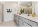Modern bathroom featuring double sinks, sleek cabinetry, and a luxurious feel at 10516 Pleasant Branch Dr # 34, Raleigh, NC 27614