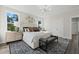 Cozy bedroom featuring stylish decor, ample natural light, and a comfortable seating area at 10516 Pleasant Branch Dr # 34, Raleigh, NC 27614