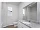 Bathroom with large mirror and granite countertop vanity at 11470 International Dr, Middlesex, NC 27557