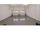 Spacious two car garage with painted floor and automatic door openers at 1200 Gathering Park Cir # 302, Cary, NC 27519
