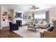 Cozy living room features a fireplace, built-in bookshelves, and plush seating at 1200 Gathering Park Cir # 302, Cary, NC 27519
