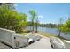 Scenic view of the lake from wood porch with white railings at 1200 Gathering Park Cir # 302, Cary, NC 27519