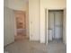 Bedroom with an open closet, carpet flooring, and doorways to other rooms at 12124 Warwickshire Park, Raleigh, NC 27613