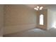 Dining room with decorative wallpaper and an arched window at 12124 Warwickshire Park, Raleigh, NC 27613
