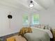 Bright bedroom with white walls, soft decor, and ample natural light at 1243 Nc 231, Wendell, NC 27591
