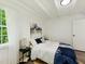 Bright bedroom featuring nature-inspired wall art and matching bedside lamps at 1243 Nc 231, Wendell, NC 27591