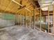 The spacious garage interior features a concrete floor and cinder block walls at 1243 Nc 231, Wendell, NC 27591