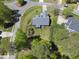 Aerial view of backyard with landscaping and outdoor space, as well as surrounding neighborhood at 129 Camille Cir, Youngsville, NC 27596