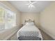 Bedroom featuring iron bed frame, decorative pillows and natural light at 129 Camille Cir, Youngsville, NC 27596