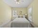 Bright bedroom with neutral decor, carpet flooring, and a ceiling fan at 129 Camille Cir, Youngsville, NC 27596