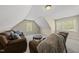 Cozy upstairs living room with carpet, and seating at 129 Camille Cir, Youngsville, NC 27596
