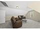 Cozy upstairs living room with carpet, and seating at 129 Camille Cir, Youngsville, NC 27596