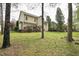 Well-maintained backyard with a wooden deck perfect for outdoor gatherings at 1335 Saint Andrews Dr, Mebane, NC 27302