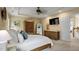 Bright main bedroom featuring a ceiling fan, walk-in closet, and ample natural light at 1335 Saint Andrews Dr, Mebane, NC 27302