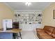 Cozy office featuring custom built-ins, neutral paint, crown molding and soft carpet at 1335 Saint Andrews Dr, Mebane, NC 27302