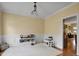 Bright playroom with wainscoting, light yellow walls and hardwood floors at 1335 Saint Andrews Dr, Mebane, NC 27302