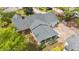 Aerial view of the property showcasing the roof, landscaping, and surrounding neighborhood at 1410 Cross Link Rd, Raleigh, NC 27610