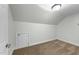 Cozy bedroom showcasing neutral carpeting, and a side door closet at 144 W Walker Woods Ln, Clayton, NC 27527