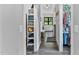 Walk-in closet with built-in shelving and access to the main bathroom at 1506 Gormly Cir, Sanford, NC 27330