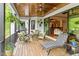 Cozy outdoor deck featuring comfortable seating, a ceiling fan, and views of interior space at 1506 Gormly Cir, Sanford, NC 27330
