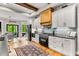 Bright kitchen with a brick backsplash, stainless steel appliances, and hardwood floors at 1506 Gormly Cir, Sanford, NC 27330