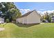 A house backyard with lots of room and a deck at 1601 Entheos Ln, Raleigh, NC 27610