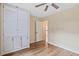 Cozy bedroom with built-in storage and wood flooring at 1601 Entheos Ln, Raleigh, NC 27610