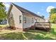 Home exterior features a deck and well-maintained yard at 1601 Entheos Ln, Raleigh, NC 27610