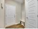 A convenient entryway with a coat rack and bench for storage at 1614 Brussels Drive Dr, Apex, NC 27502