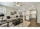 Inviting living room boasts an open floor plan with modern kitchen and dining area at 1614 Brussels Drive Dr, Apex, NC 27502