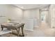 Cozy office nook with desk and chair on the second floor landing, perfect for work from home at 1614 Brussels Drive Dr, Apex, NC 27502