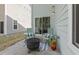 Cozy back patio featuring outdoor seating and fire pit, perfect for relaxing evenings at 1614 Brussels Drive Dr, Apex, NC 27502