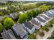 A neighborhood with well-maintained homes and mature trees near a highway at 1640 Legendary Ln, Morrisville, NC 27560