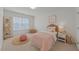 Inviting bedroom featuring a twin bed, woven accents, and a light, airy atmosphere at 1640 Legendary Ln, Morrisville, NC 27560