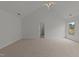 Spacious bedroom with plush carpet, vaulted ceilings, and abundant natural light at 1640 Legendary Ln, Morrisville, NC 27560