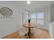 Cozy breakfast nook with a round table and natural light at 1640 Legendary Ln, Morrisville, NC 27560