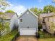 Exterior of home featuring gray siding, a driveway, and a two-car garage at 1640 Legendary Ln, Morrisville, NC 27560