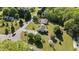 Aerial view of a house with expansive front and back yards in a lush green neighborhood at 20 Sanders Rd, Benson, NC 27504
