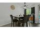 Bright dining area features a modern ceiling fan and natural light at 20 Sanders Rd, Benson, NC 27504
