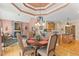 Charming dining area with view of fireplace, breakfast bar and kitchen in an open floorplan at 2000 Silverleaf Dr, Youngsville, NC 27596