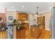 Well-appointed kitchen featuring granite countertops, custom cabinetry, and stainless steel appliances at 2000 Silverleaf Dr, Youngsville, NC 27596