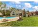 Inviting backyard pool area with a patio, perfect for outdoor entertaining at 2000 Silverleaf Dr, Youngsville, NC 27596