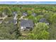 Beautiful aerial view of a home with a landscaped backyard surrounded by lush greenery at 212 Hein Dr, Clayton, NC 27527