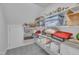 Well-organized attic featuring built-in shelves with storage containers and decorations at 212 Hein Dr, Clayton, NC 27527