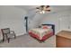 Spacious bedroom featuring a queen bed, vaulted ceilings, and gray carpet at 212 Hein Dr, Clayton, NC 27527